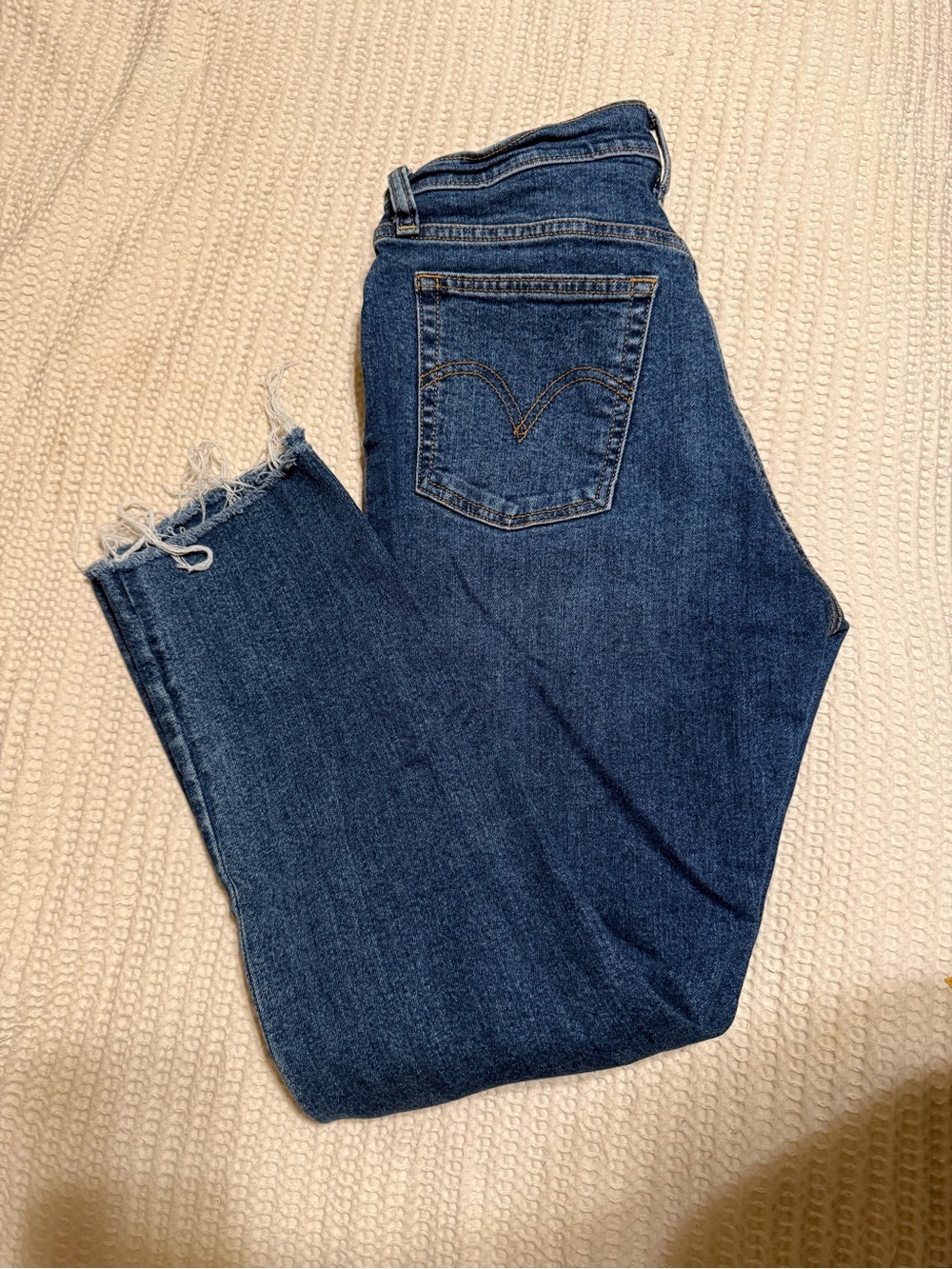 Levi's Straight-Leg Dark Blue Denim Jeans with Frayed Hem